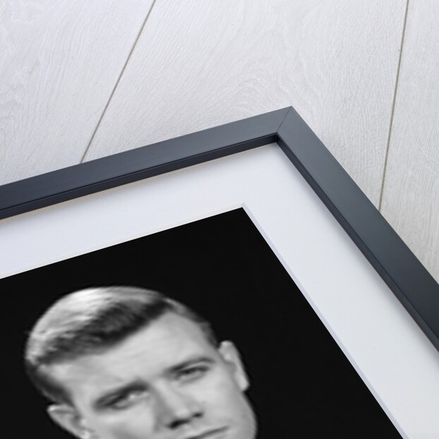 1950s double exposure of man with a smile and a frown wearing a suit by Anonymous