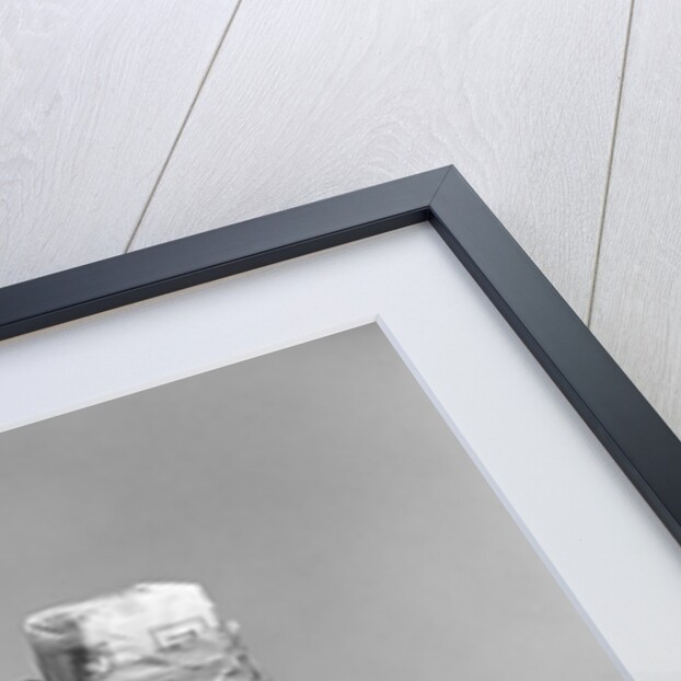 1950s smiling woman carrying grocery bags both hands looking at camera over her shoulder by Anonymous