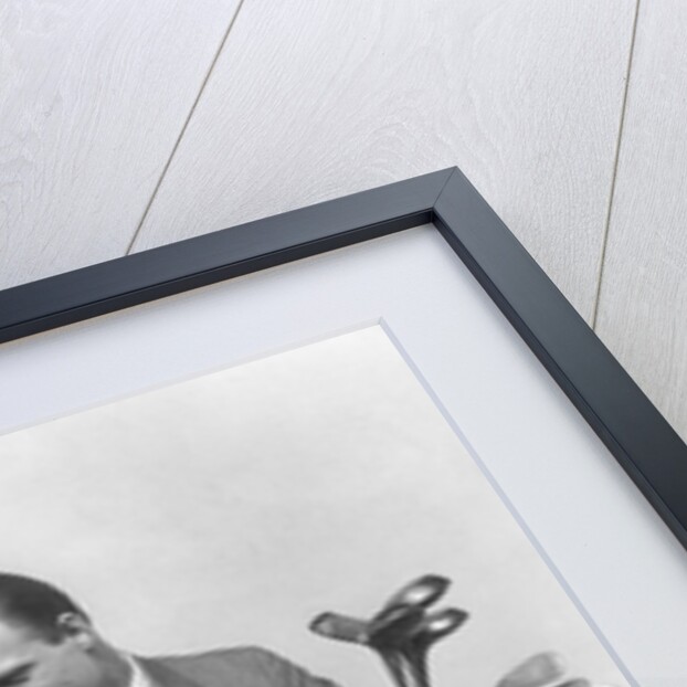 1930s two men one woman golf clubs bag smiling talking sitting bamboo chair man smoking pipe by Anonymous