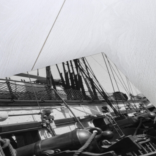 1930s row of cannon breeches on gun deck of sailing naval ship of war by Anonymous