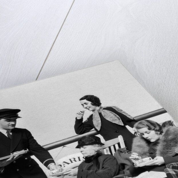 1930s 1920s three women being served tea by a steward on board an ocean liner crossing the atlantic ocean by Anonymous