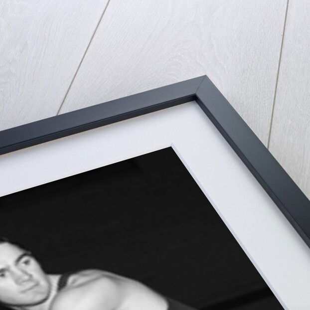 1930s teen boy playing basketball holding ball standing in position by Anonymous