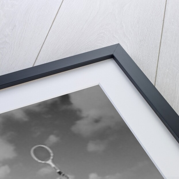 1930s back view of man playing tennis about to hit the ball summer outdoor by Anonymous