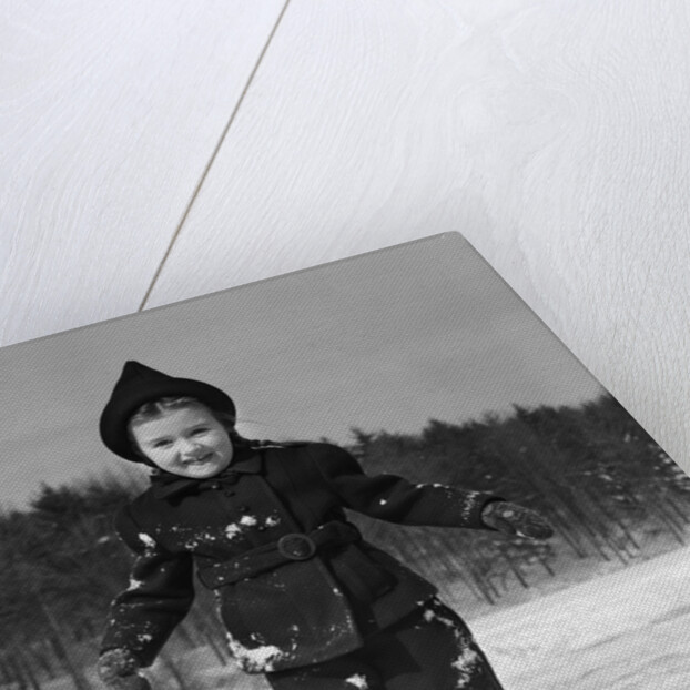 1930s worried cautious little girl on ice skates looking at camera by Anonymous