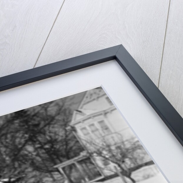 1950s woman mother pulling boy son on sled in winter by Anonymous