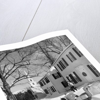 1960s woman walking to rural mailbox in front of home in snow piled with christmas packages by Anonymous