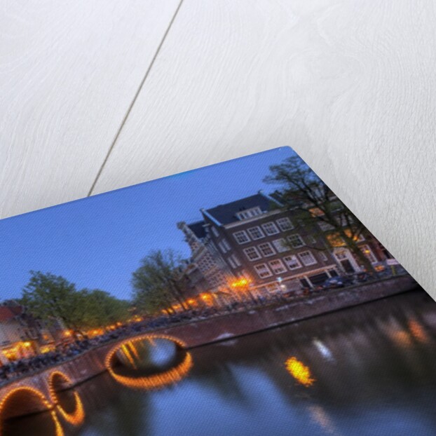 Evening light old buildings and bridge along the many Canals of Amsterdam, Netherlands by Anonymous