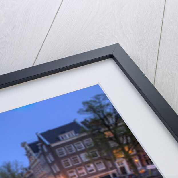Evening light old buildings and bridge along the many Canals of Amsterdam, Netherlands by Anonymous
