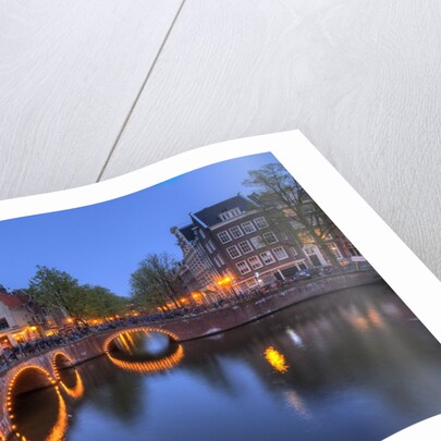 Evening light old buildings and bridge along the many Canals of Amsterdam, Netherlands by Anonymous