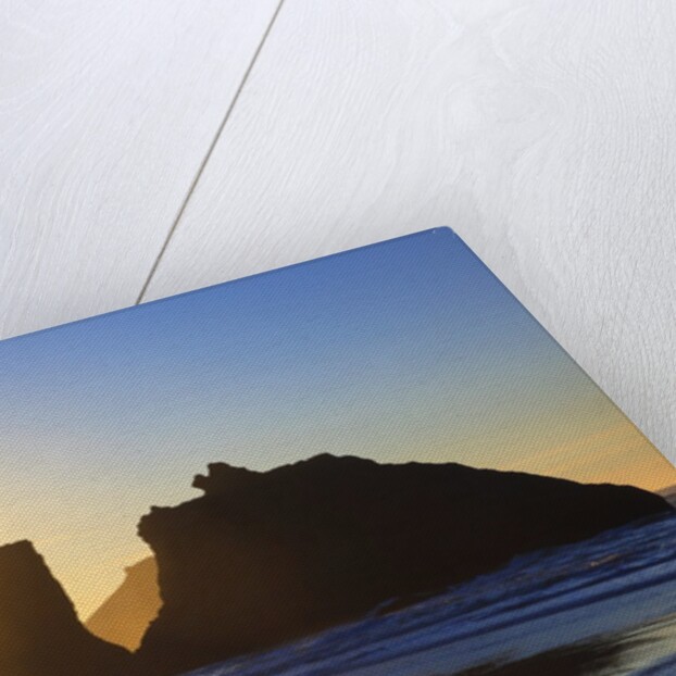 sunset over rock formations along Bandon Beach at lowtide, Oregon Coast by Anonymous