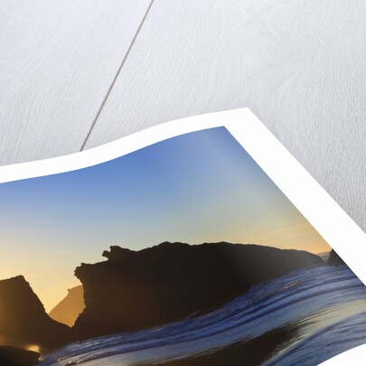 sunset over rock formations along Bandon Beach at lowtide, Oregon Coast by Anonymous