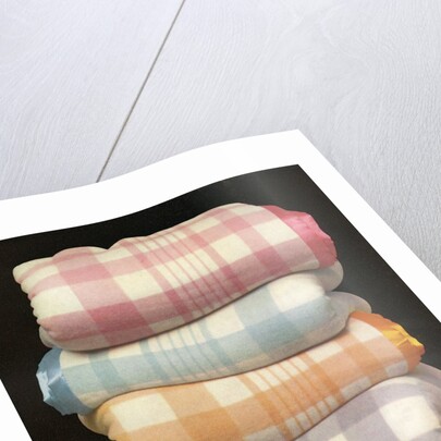 Vintage illustration of four stacked wool blankets by Anonymous