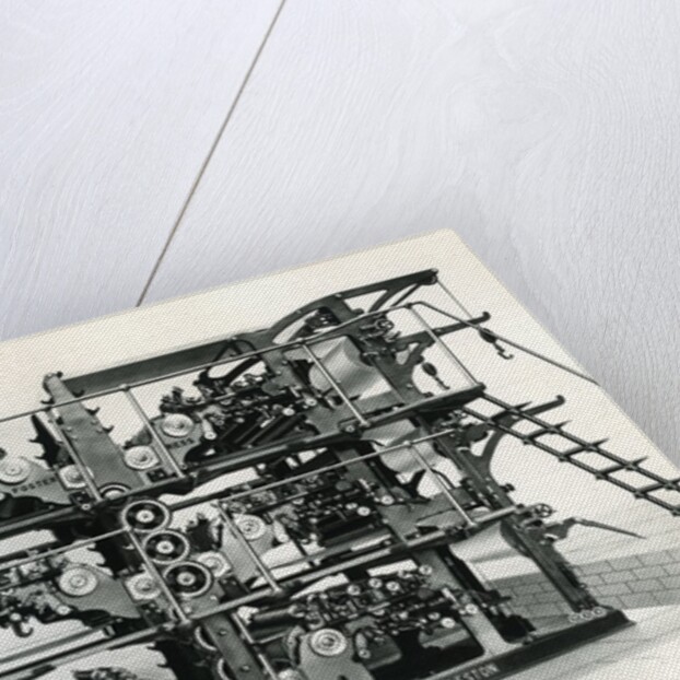 Vintage newspaper printing and folding machine by Anonymous