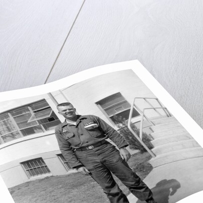 US army soldier poses for a photo on base, ca. 1954. by Anonymous