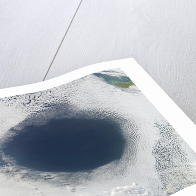 Cloud hole caused by intense high pressure system by Anonymous