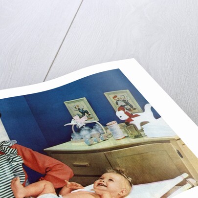 1940s Mother with Her Baby on a Changing Table in a Nursery. by Anonymous