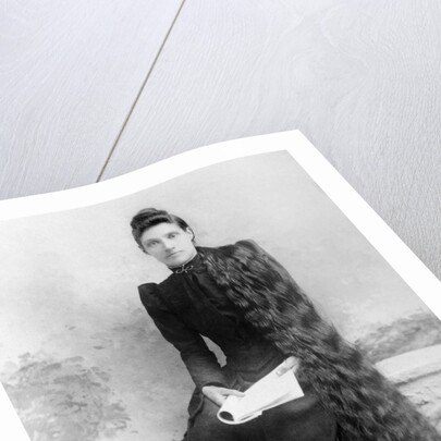 Young woman with long hair portrait, ca. 1900. by Anonymous