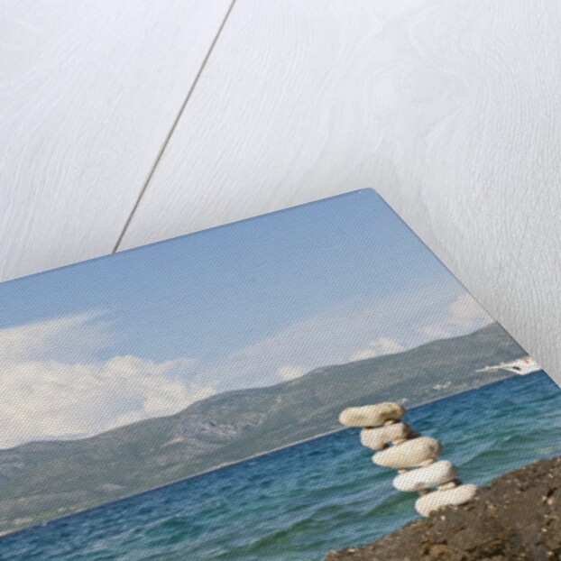 Stack of pebbles on cliff, Lumbarda, Korcula island, Croatia by Anonymous
