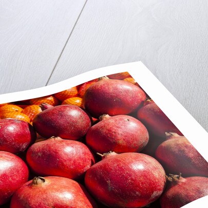 Pomegranates in Carmel Market by Anonymous