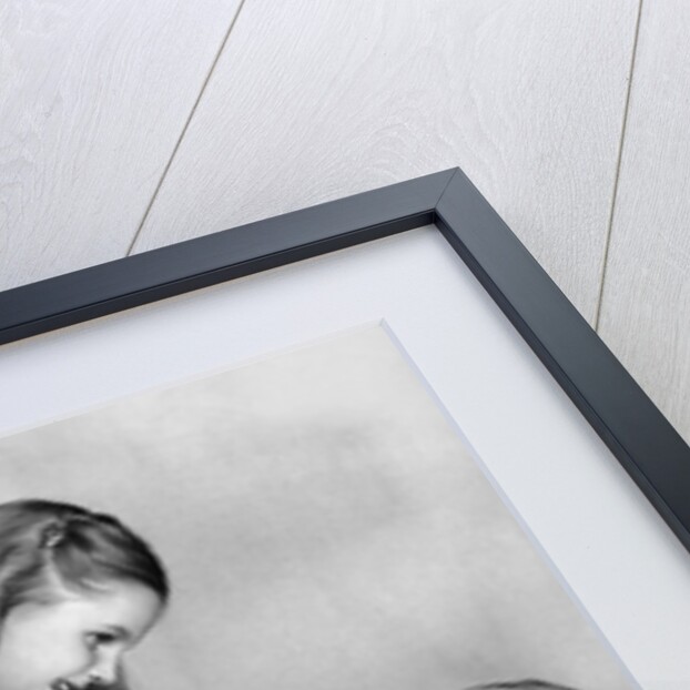 Big sister looks down on her baby brother, ca. 1948 by Anonymous