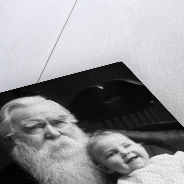 Senior man holds his grandson, ca. 1910 by Anonymous