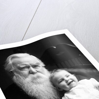 Senior man holds his grandson, ca. 1910 by Anonymous