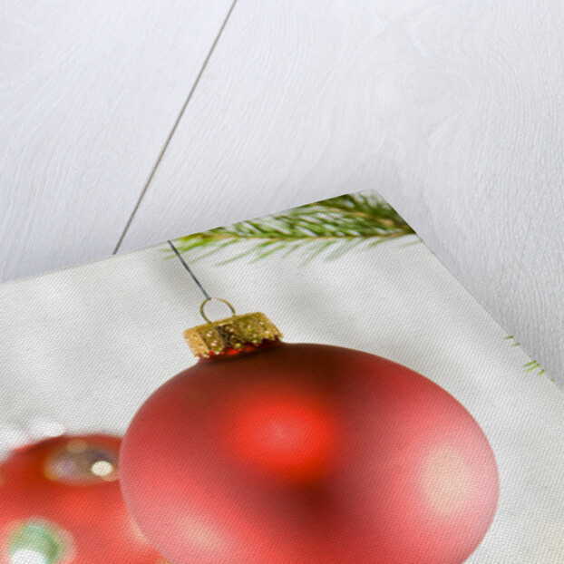 Close-up of hanging red and blue Christmas baubles by Anonymous