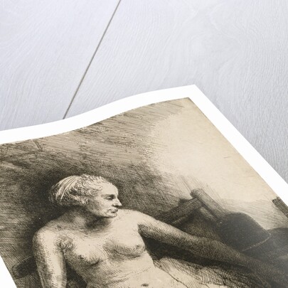 A Woman At The Bath With A Hat Beside Her by Rembrandt van Rijn