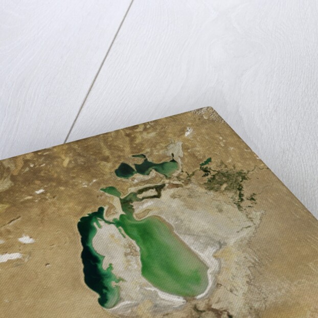 Satellite view of the Aral Sea in 2002, with the 1960 shoreline super-imposed by Anonymous