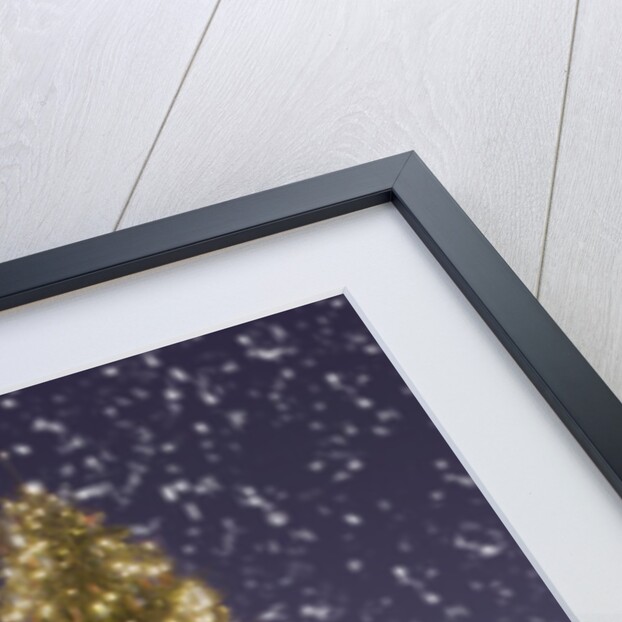 Christmas tree under snowfall by Anonymous