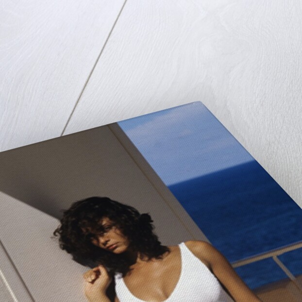 1990s Woman Wearing White Bathing Suit Looking At Camera by Anonymous