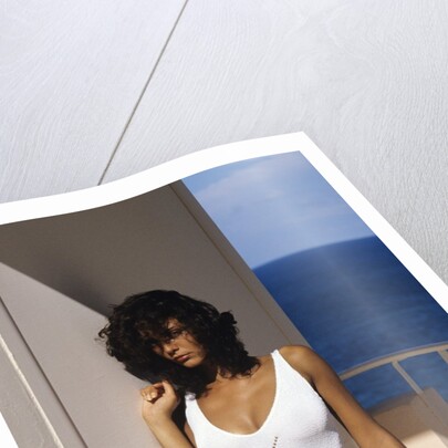 1990s Woman Wearing White Bathing Suit Looking At Camera by Anonymous