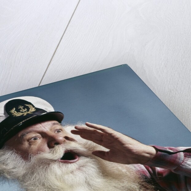 1960s Senior Man Full White Beard Wear Ship Captains Hat Shouting With Hand Cupped To Mouth by Anonymous
