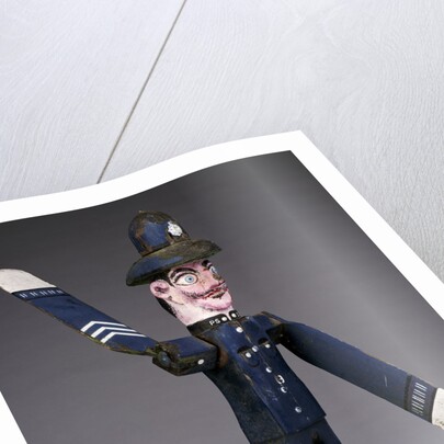 A polychrome wood and metal whirligig modelled as a police sergeant by Anonymous