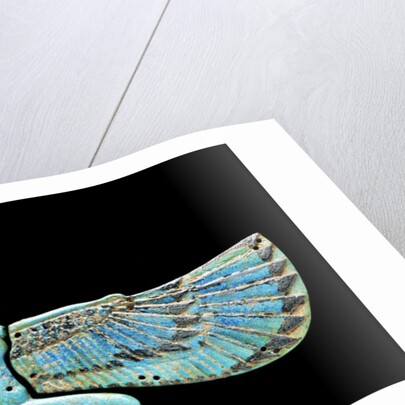 An Egyptian turquoise glazed composition pectorial in the form of a winged Isis by Anonymous