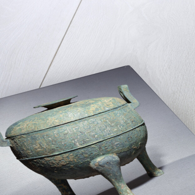 A rare large archaic bronze tripod vessel and cover 'Ding' by Anonymous