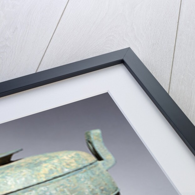 A rare large archaic bronze tripod vessel and cover 'Ding' by Anonymous