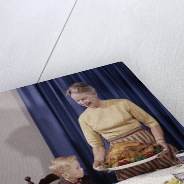 1960s Grandmother Presenting Roasted Turkey To Children At Dining Room Table by Anonymous