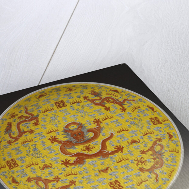 A large iron-red yellow ground dragon dish, the centre of the interior depicting a large full-faced dragon and flaming pearl by Anonymous