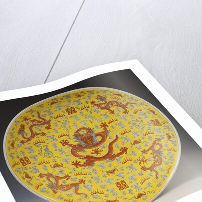 A large iron-red yellow ground dragon dish, the centre of the interior depicting a large full-faced dragon and flaming pearl by Anonymous