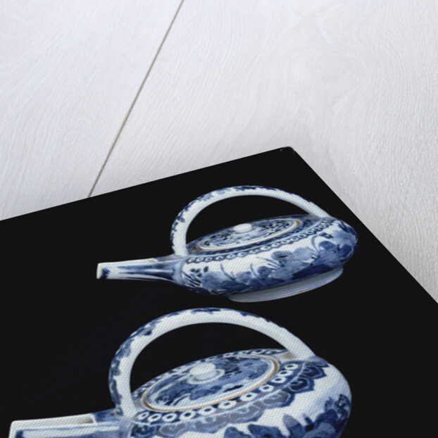 Two blue and white Arita ewers and covers by Anonymous
