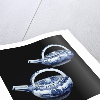 Two blue and white Arita ewers and covers by Anonymous