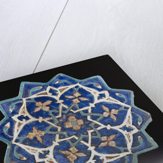 A Samarkand cuerda Seca stellar tile of twelve pointed form, the blue ground with a central turquoise and gold flower outlined in red by Anonymous