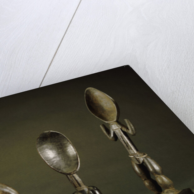 Three Dan spoons with elogated legs by Anonymous
