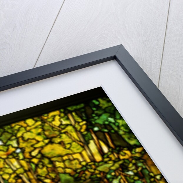Tiffany Studios leaded glass window of a woodland scene by Anonymous