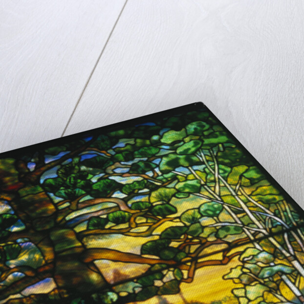 Tiffany Studios landscape window depicting a meandering stream shaded by towering fir trees by Anonymous
