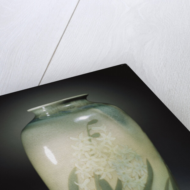 An earthenware vase depicting hyacinths and leafage in shades of ivory and green by Anonymous