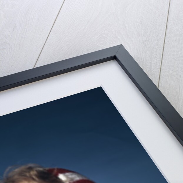 1960s Smiling Woman Wearing Red Mittens Ear Muff Blue Sweater Holding Ice Skates by Anonymous