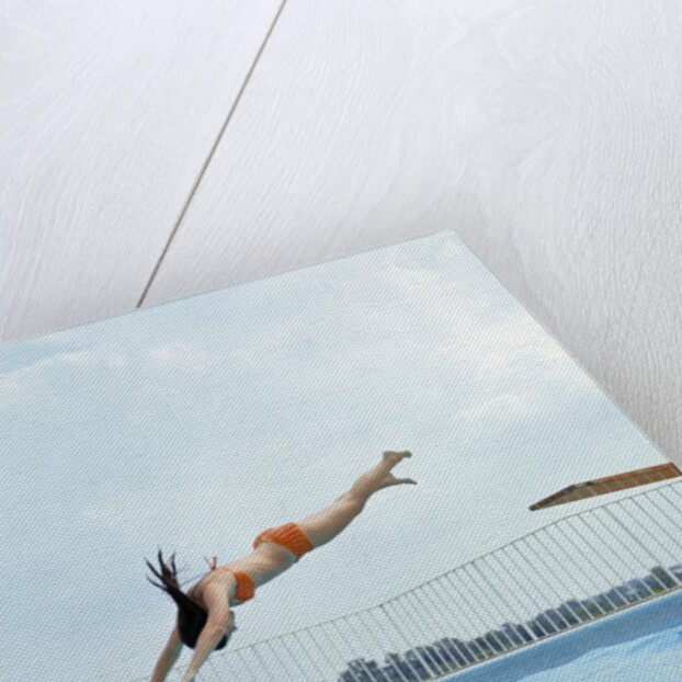 1970s Teen Girl Diving Into Swimming Pool by Anonymous