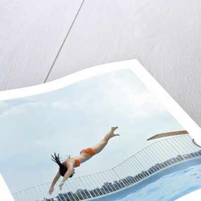 1970s Teen Girl Diving Into Swimming Pool by Anonymous
